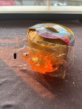 Orange Dino Glitter Squishy (NWT)